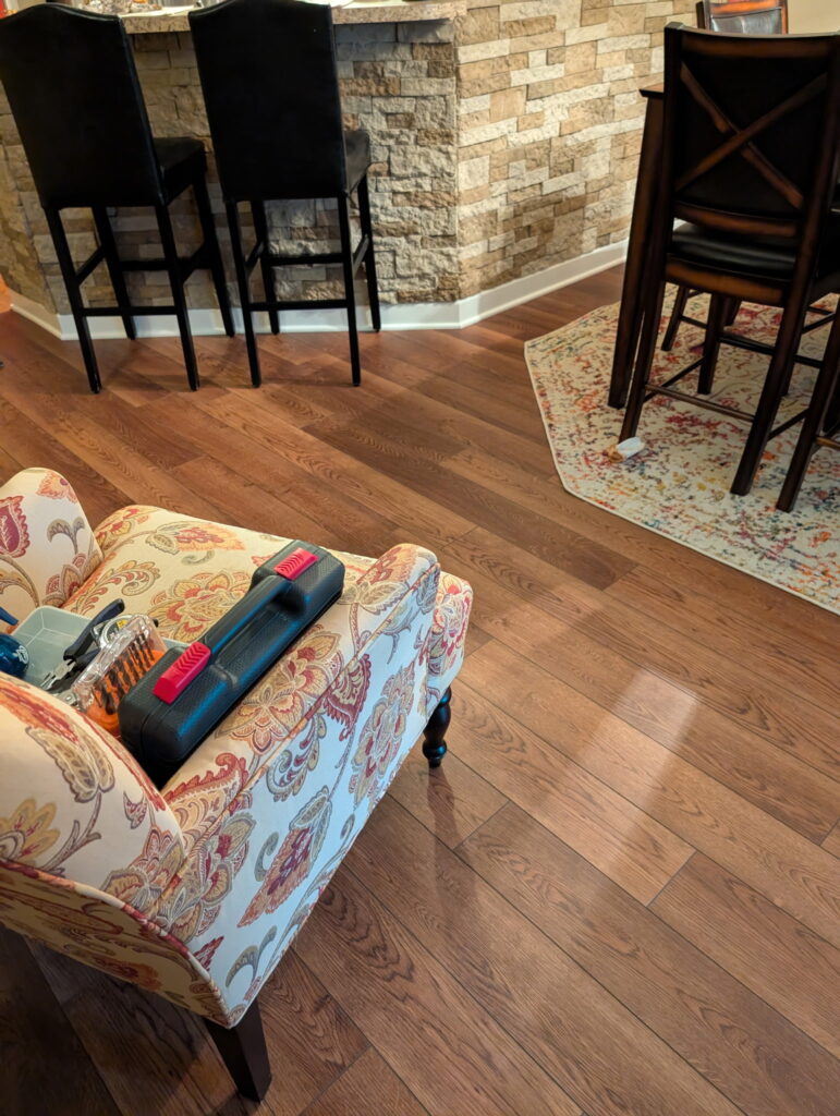 New luxury vinyl plank flooring installed after water damage repair