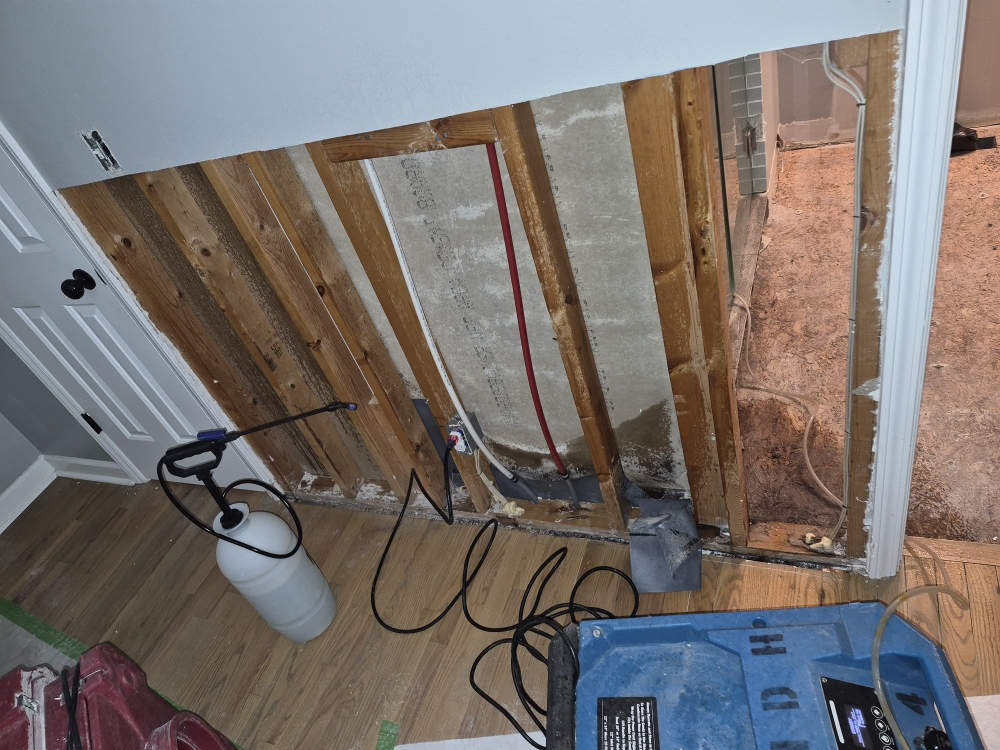 Flood cut drywall and air scrubber during emergency water extraction in Apex NC